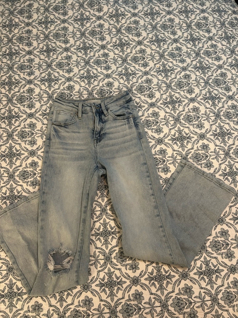 Light Blue Flare Jeans with Distressed Knee